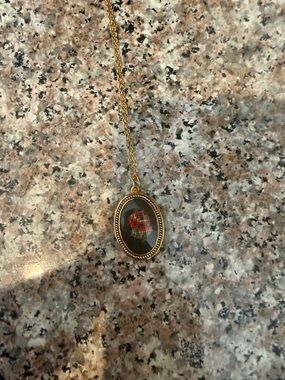 Gold Oval Pendant Necklace with Red Rose Motif